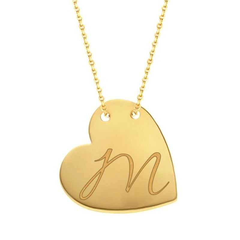 Cursive M traced across a polished solid 14K yellow gold heart pendant