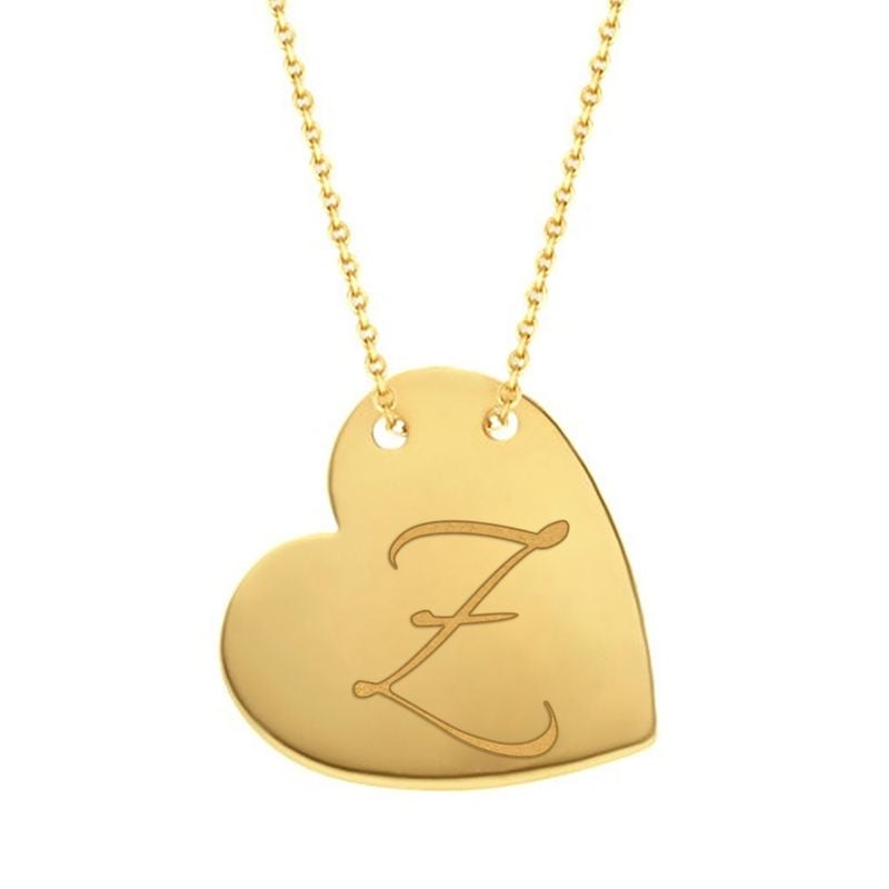 Cursive Z traced across a polished solid 14K yellow gold heart pendant