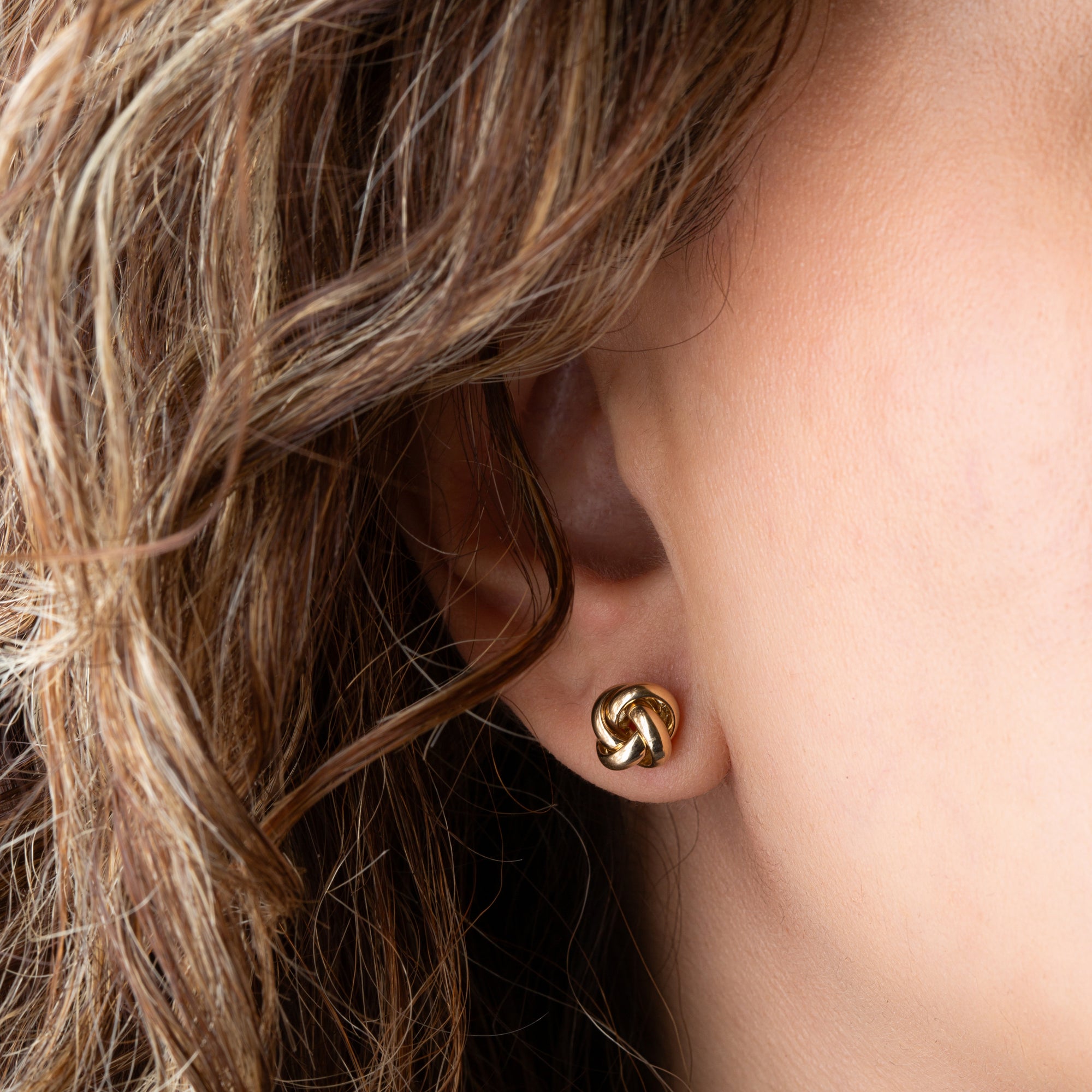 14K Yellow Gold Intertwined Love Knot Stud Earrings, view 2