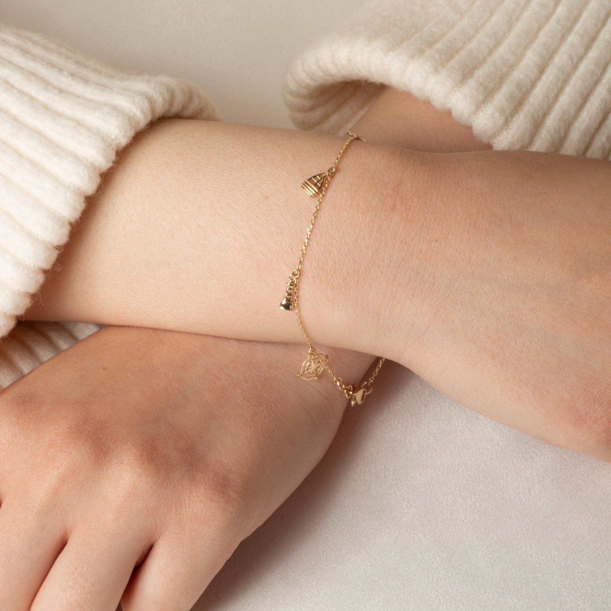 14K Yellow Gold Nautical Anchor Ocean Dolphin Charm Bracelet 7", view 2