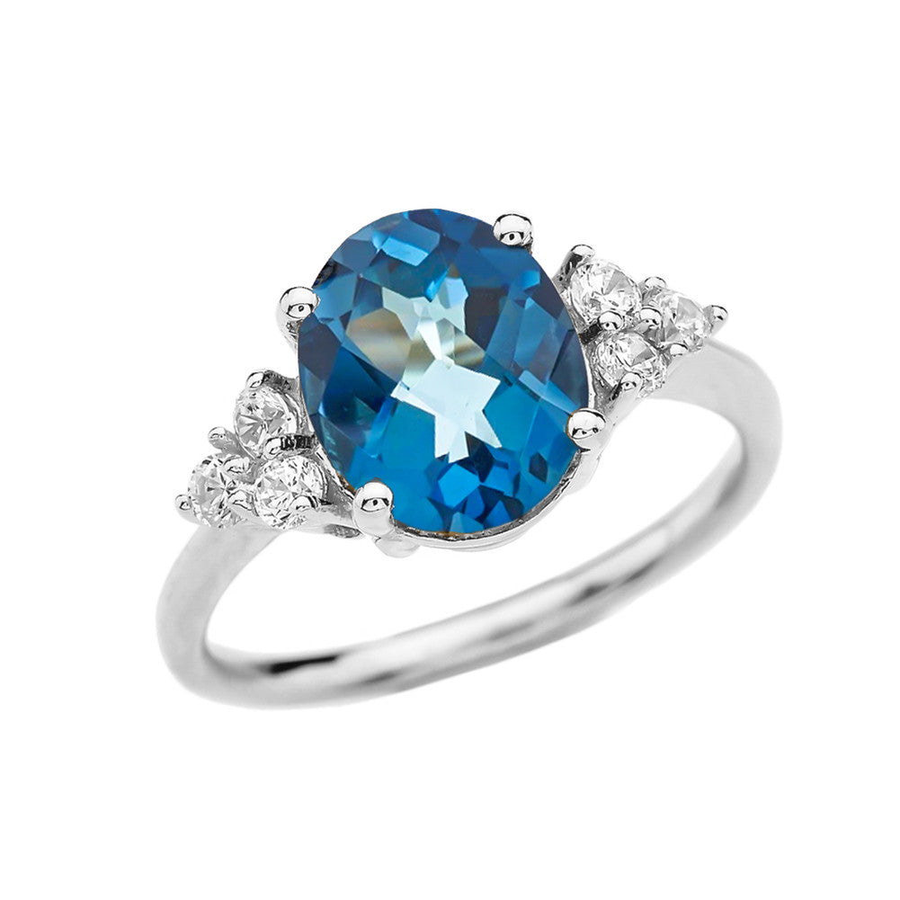 3 Carat Blue Topaz Solitaire Gold Modern Proposal/Promise Ring With White Topaz Sidestones, view 3