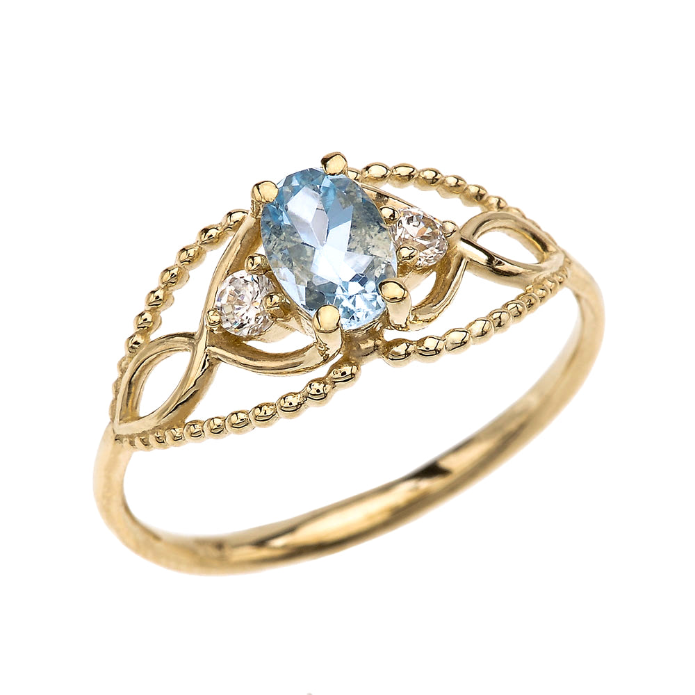 Elegant Beaded Solitaire Ring With Aquamarine Centerstone and White Topaz in Yellow Gold