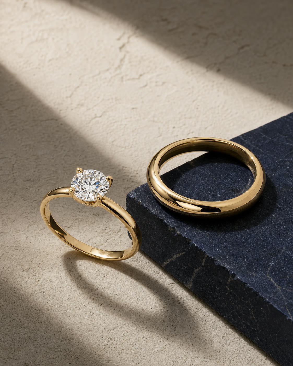 An editorial arrangement of yellow-gold rings